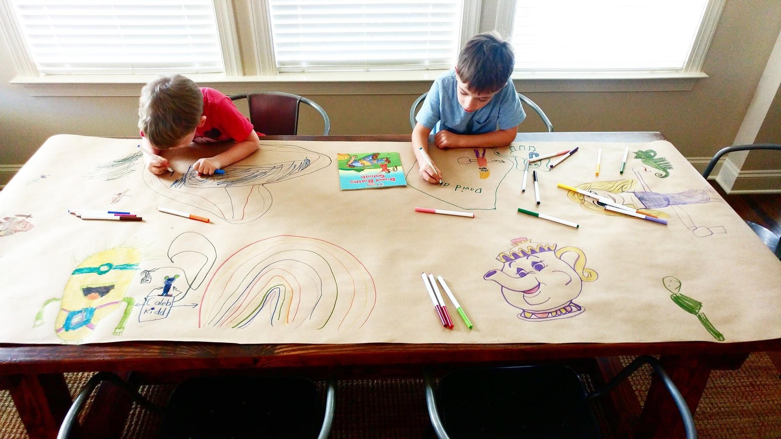 Kids practicing pre-writing skills and drawing for kindergarten readiness
