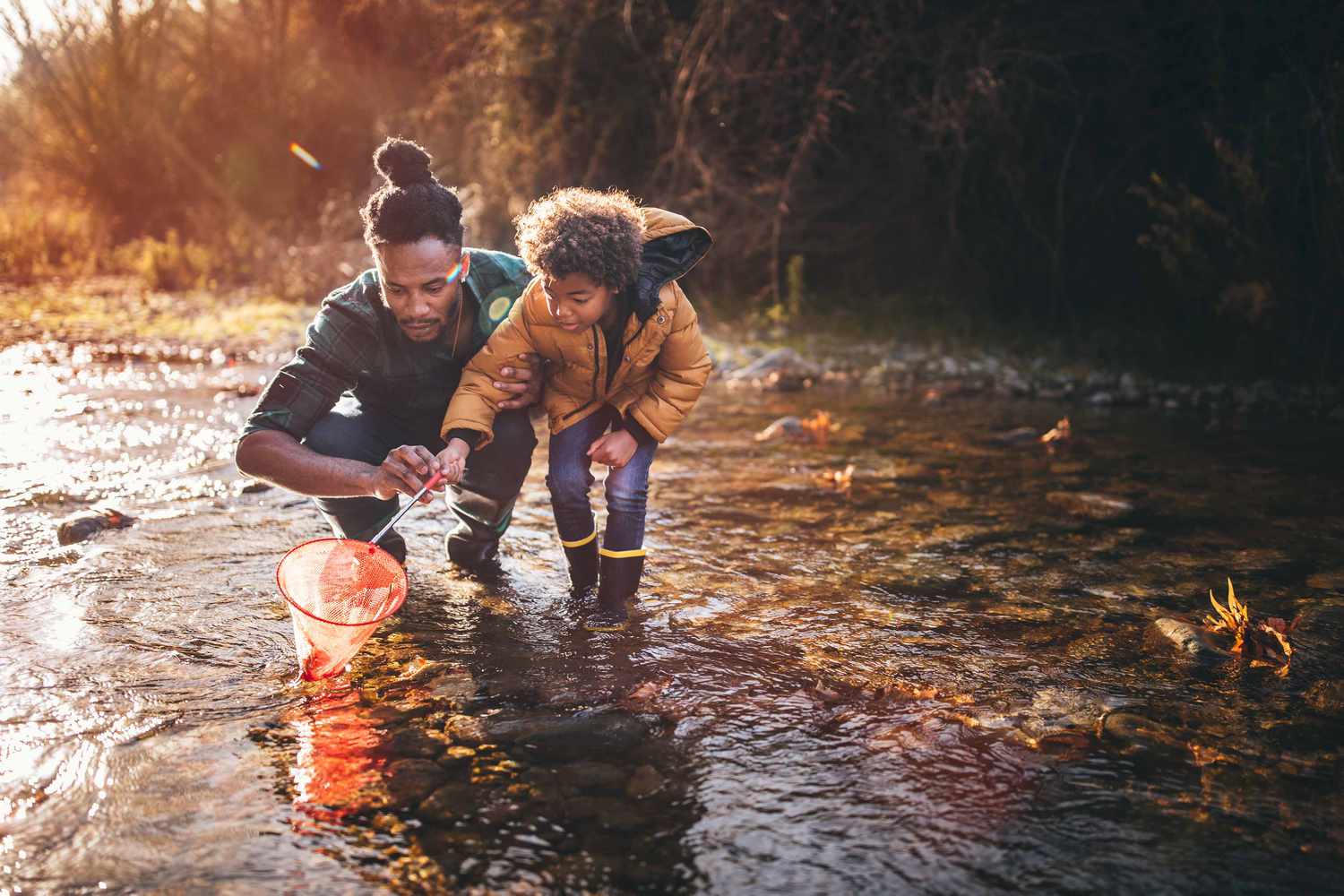 Parent and child exploring nature together instead of screens